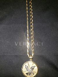 24 inch 10k gold with eagle pendent 27.60 grams all together 