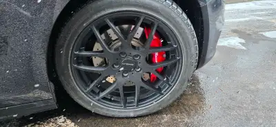 Selling a full set of high-performance winter tires mounted on black Bralin alloy rims. Very low mil...