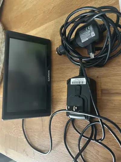 Includes Arm for attachment,Adapter for cigarette lighter and Charging plug.