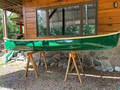 Manitou 14' Fiberglass Canoe. Hand crafted in Lakefield Ontario. Seats 2 or 3. This is a fast canoe,...