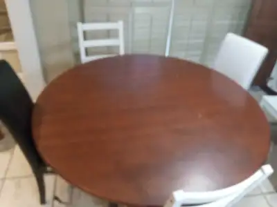 This round dining table features a sturdy design and is perfect for a smaller dining space. This is...