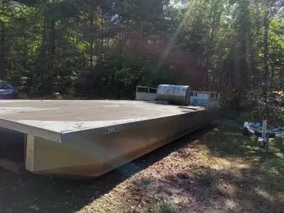 13' × 37' pontoon boat for sale. Use it to build your floating cabin on or use as it is for hauling....
