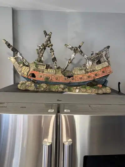Ahoy there, mateys! Check out this used but still seaworthy ship decoration for your aquarium. This...
