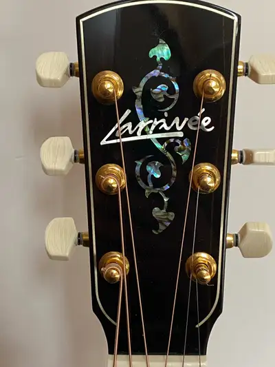 Awesome tone, feel and looks. Gorgeous special Larrivée logo and inlay design on the headstock. The...