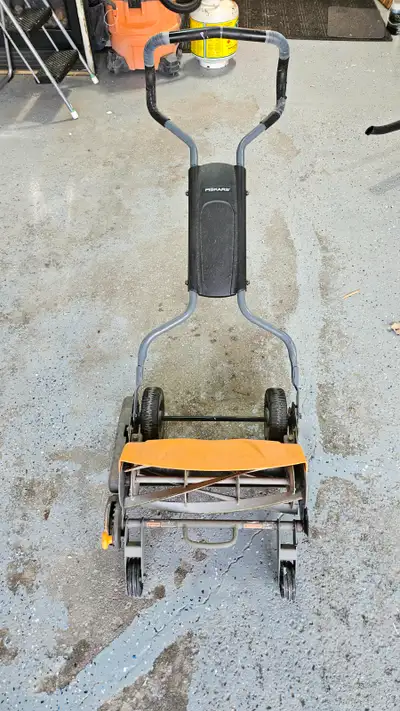 Fiskar stay sharp push mower, View more
