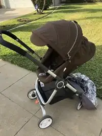 Stoke Scoot stroller with accessories 