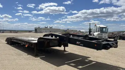 61940 kg GVWR Air Brakes 26 ft 8 in Main Deck 4 ft Fixed Dovetail 132 in Usable Deck Width 11R22.5 T...