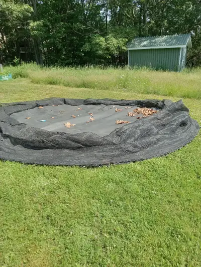 Trampoline mat with mesh side net attached. $20. pick up north end Dartmouth