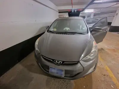 2012 Hyundai Elantra Limited with the Technology Package Features: * Power sunroof * 17-inch alloy w...