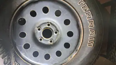 Set of 4 all season tires with less than 1500 km on them for sale, size 265/70/17 mounted on rims, a...