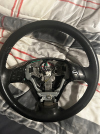 Mazda 3 Leather wrapped steering wheel