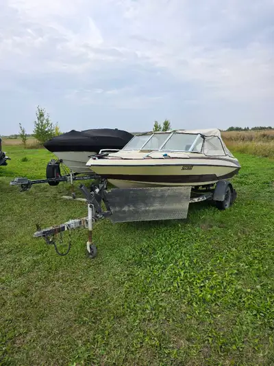 1985 with a 140 hp Johnson good shape floor is good comes with lots of extra trailer good motor good...