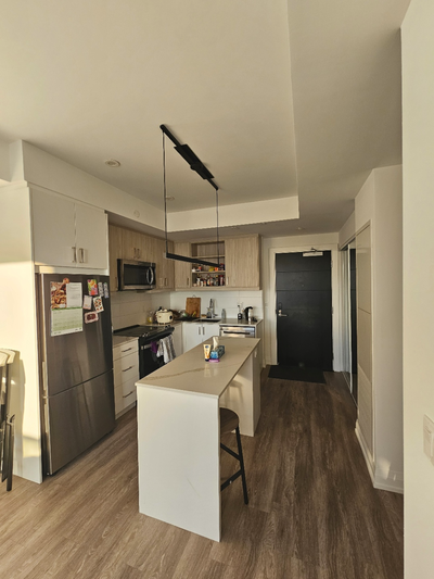 A spacious and modern 1 bed 1 bath apartment with a balcony and floor-to-ceiling windows. In-unit la...