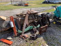 Antique farm tools , chandelier, retro stereo