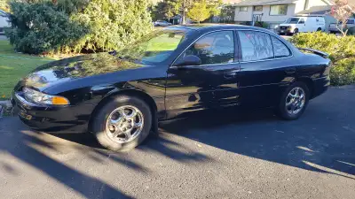 -1998 Oldsmobile Intrigue GLS -Top trim package -V6 -Automatic Transmission 4 speed -Black Exterior...