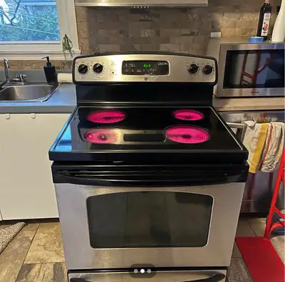 Stainless General Electric Stove, View more