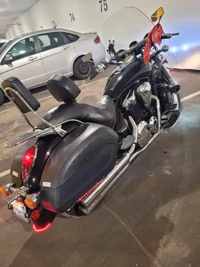 Honda,2010 black,new front tire,new break front,sterio with 3 speakers,hwy pegs saddle bags, windshi...