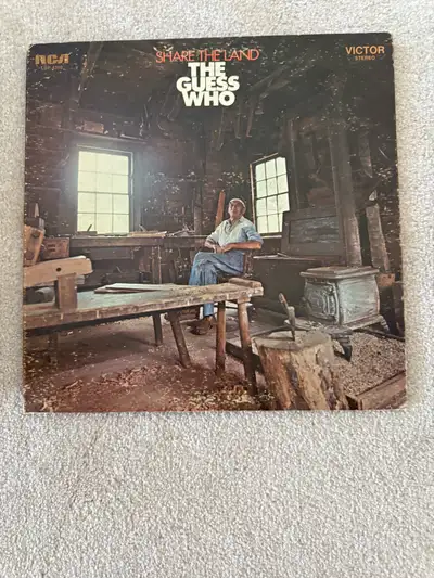 Own a piece of Canadian rock history with The Guess Who's "Share the Land" vinyl record from 1970! T...
