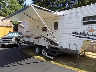 Just in time for the camping season! A pristine 26 foot Wildwood 5th wheel with a queen sized walk a...