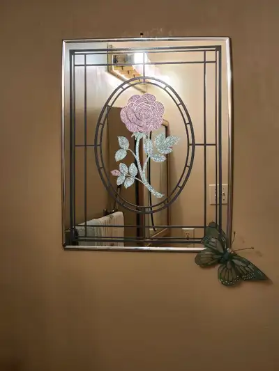 Rose mirror measuring 25 1/4 in x 16.5 in. Moving sale, so $25 obo and needs to be taken as soon as...