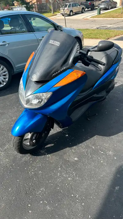 This 2005 Yamaha Majesty is a reliable scooter with 13k kilometers on it, offering a smooth ride and...