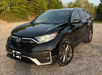 Black Honda Crv Sport. Low kms, great condition. Winter tires with rims and extended warranty to 160...