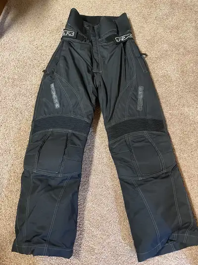 Women’s snowmobile pants, size 10. These are racer style with no bib, or straps over your shoulder -...