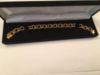 Yellow gold bracelet 14K .7 inch. 11 gm.
