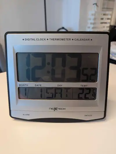 Digital Clock, Thermometer, Calendar. Excellent Condition. No Scratches. Like New Condition. User Ma...