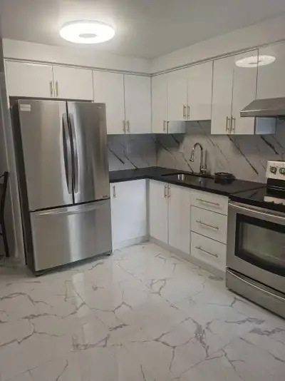 Downtown Toronto near Bathurst & Dundas Main floor renovated bedroom with private bathroom and share...