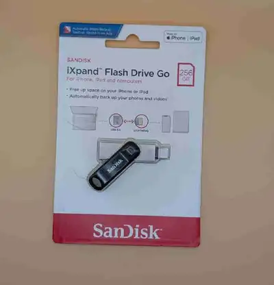 Selling a new SanDisk iXpand Flash Drive Go with 256GB of storage, designed to easily free up space...
