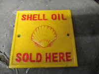 DECORATIVE SHELL OIL SOLD HERE CAST IRON SIGN $30. MANCAVE DECOR