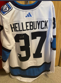 Hellebuyck Jets Autographed Jersey- whiteout