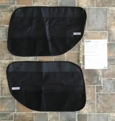 The Kurgo Car Door Guards are a waterproof pet door cover that provides universal coverage and is ad...