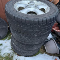 Used winter tire with alloy rims - from 2006 ford - 215/60R16