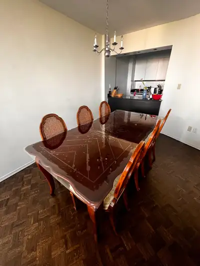 Wooden dining table with 6 back chairs, View more