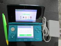 NINTENDO 3DS Aqua Blue and charger $135