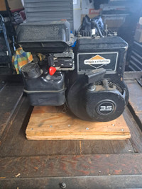 Briggs 3.5 HP engine with 6:1 gear reduction.