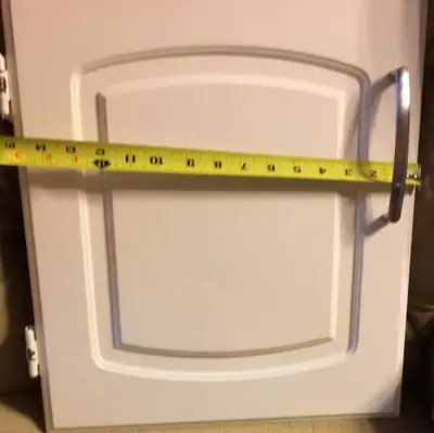 A pair of white cabinet doors 0.5"x30"x16.5" --------------- $50 obo Satin Nickel Pull Handles & Hin...