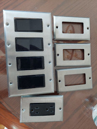 Plaques pour interrupteur en stainless, avec interrupteurs noirs