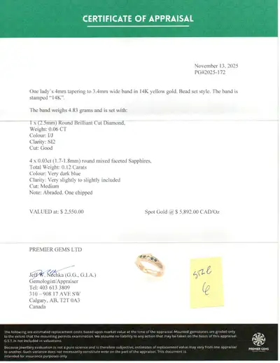 4 mm tapering to 3.4mm wide band in 14K yellow gold. Bead set style. The band is stamped "14K" The b...