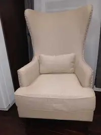 Beige wing back chair