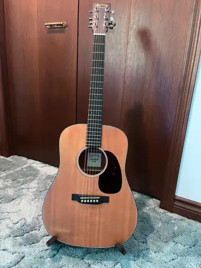 Martin Dreadnought Jr acoustic/electric guitar. I bought this guitar new in Feb 2017. I registered i...