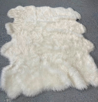 Faux fur white area rug