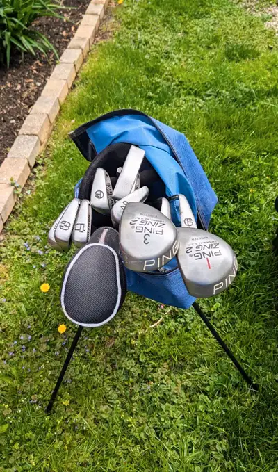 12 piece right hand men's set. 1,3, 5 Ping "zing 2" Drivers, ping putter 8 Piece Spalding Mark IV Ex...