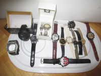 montre 12 en lot ou détail timex et autres piles à changer + pin