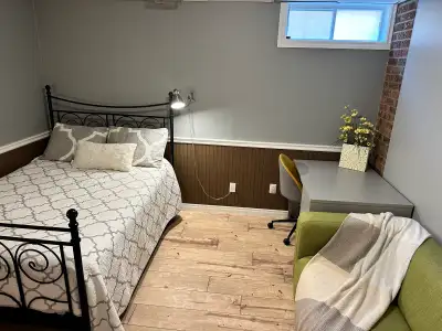 Available Now! Parking Spot Available! One room available in a fully furnished two bedroom basement...
