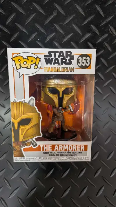 I'm offering a Funko Pop! Star Wars The Mandalorian - The Armorer #353 bobble-head figure in mint co...