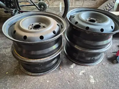 Steel rims. Will need to confirm they are 16 ". They were being used on Subaru Impreza wagon