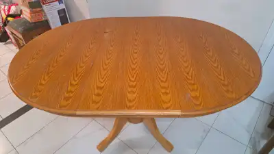 Solid Oak Pedestal Dining Table with Leaf Extension – Round/Oval, View more